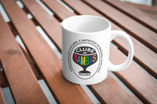 OCABS - Organização Cultural e Artística da Baixada Santista - Clube de Bambas Imagem de um notebook exibindo o logotipo da OCABS estilizado.